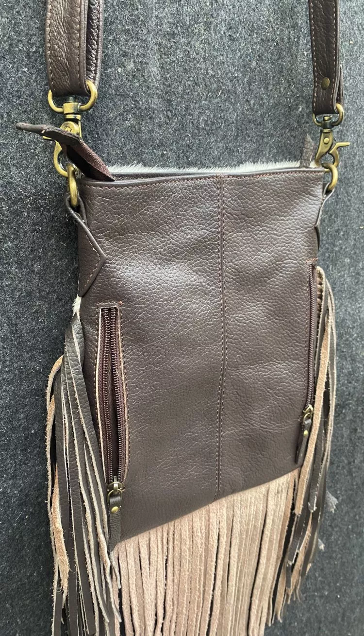 Klassy Cowgirl Leather Crossbody Bag with hair on cowhide w ith barrel racer brand